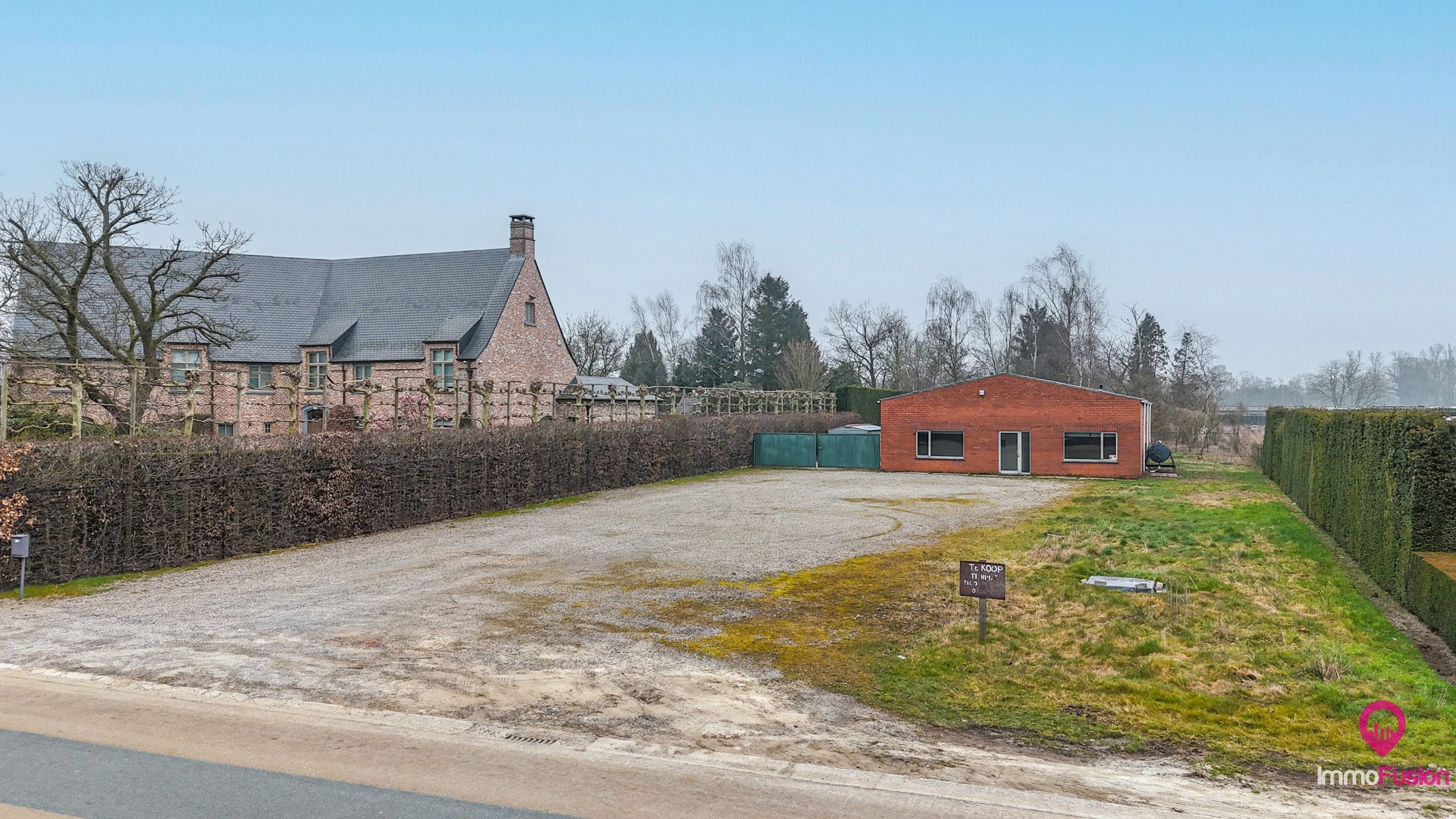 Unieke bouwgrond met een goed onderhouden bedrijfsruimte! foto 11