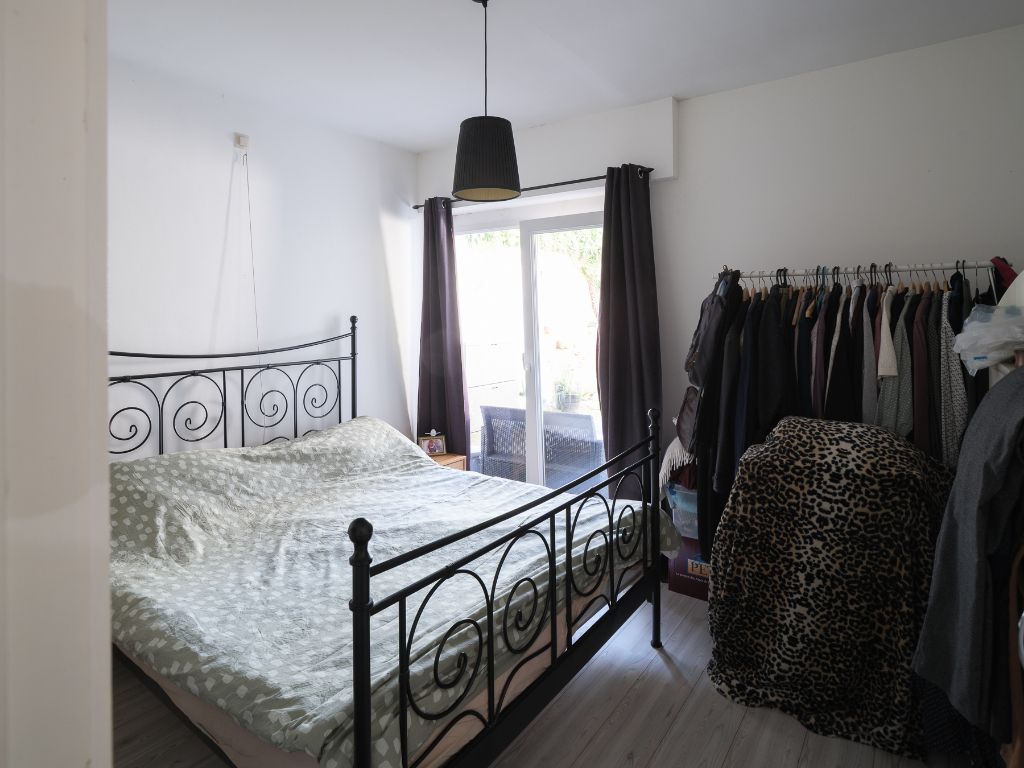 Instapklaar 2-slpk appartement met een ruime, private tuin foto 6