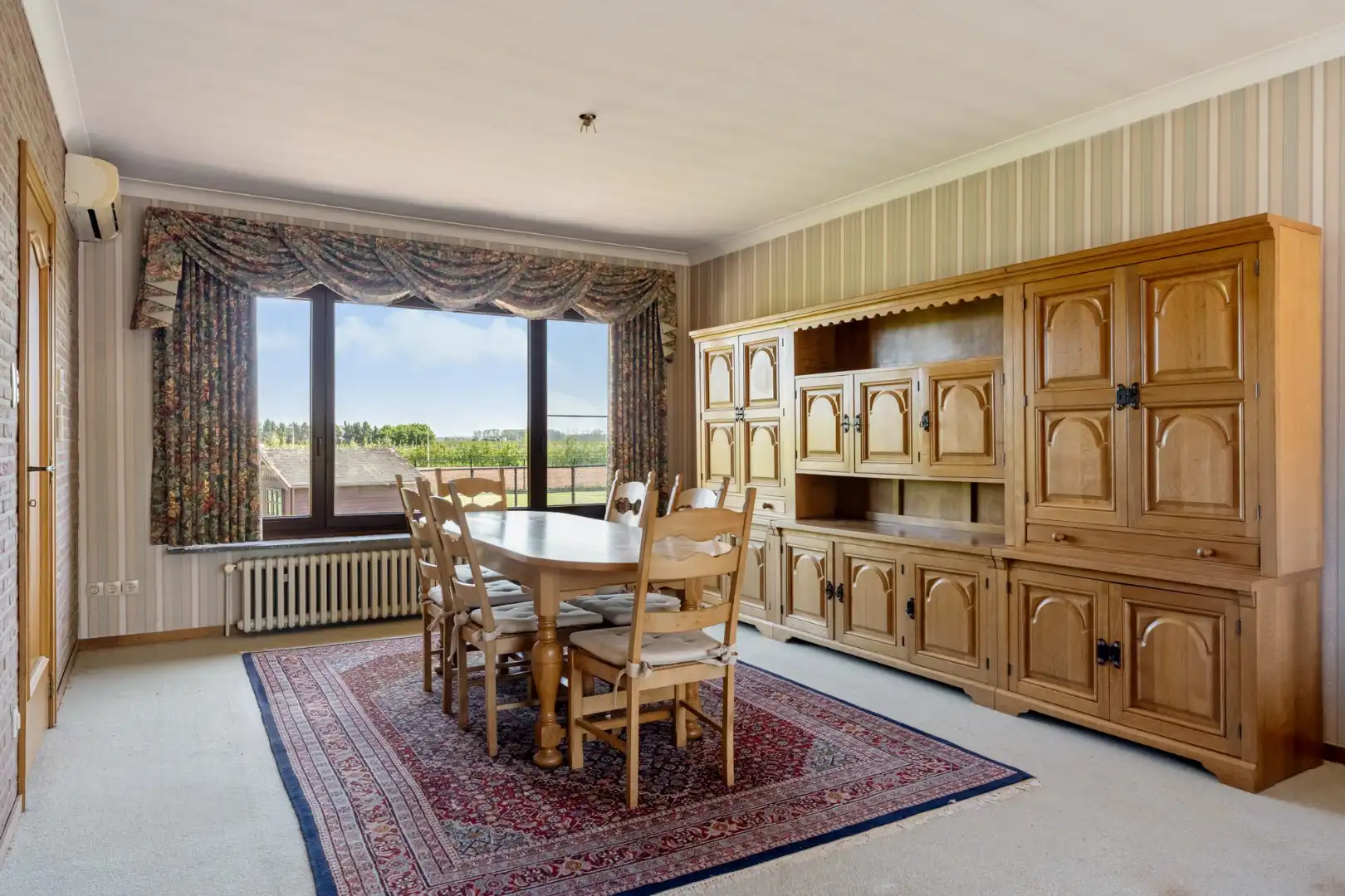 Gelijkvloerse gezinswoning op een ruim perceel van 9a51ca op een rustige locatie met uitzicht op achterliggende weilanden!  foto 7