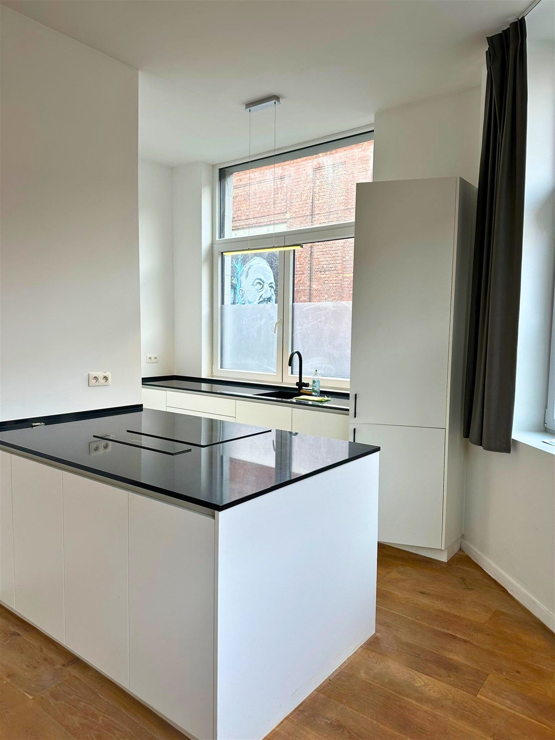 Volledig gerenoveerd gelijkvloers appartement met 2 slaapkamers  te huur in Merksem foto 4