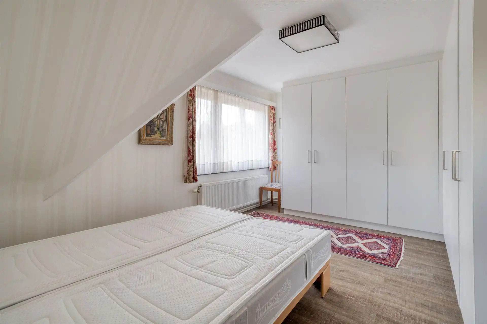 Karaktervolle woning met 3 slpk's, ruime tuin en garage! foto 13