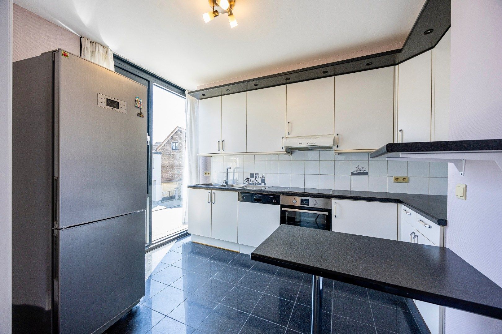 Instapklaar en energiezuinig appartement met 2 slpk te Buizingen. foto 6