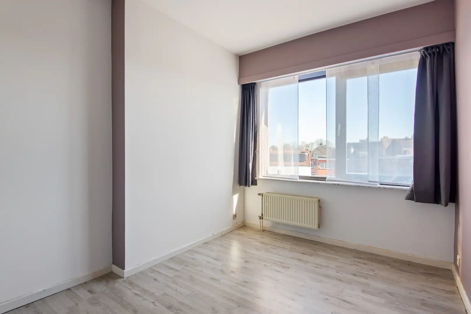 Ruim en lichtrijk 2-slaapkamerappartement in hartje Wijnegem foto 10