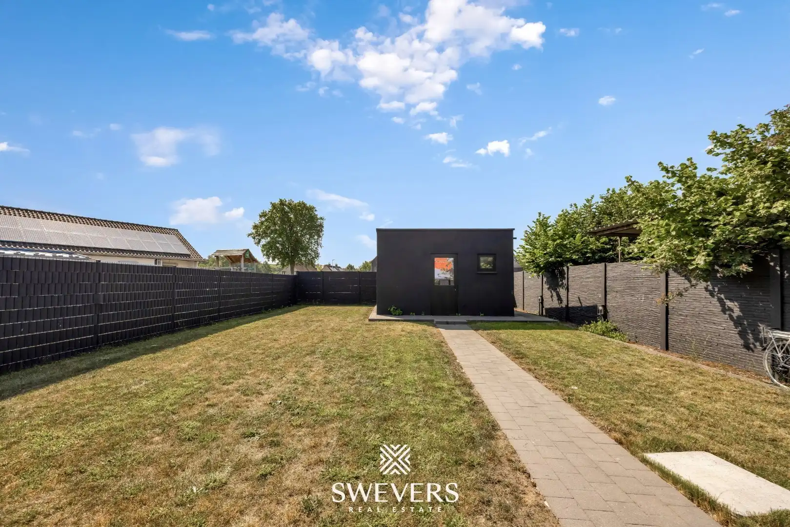 Stijlvol wonen op een ruim perceel met 4 slaapkamers en topafwerking foto 34