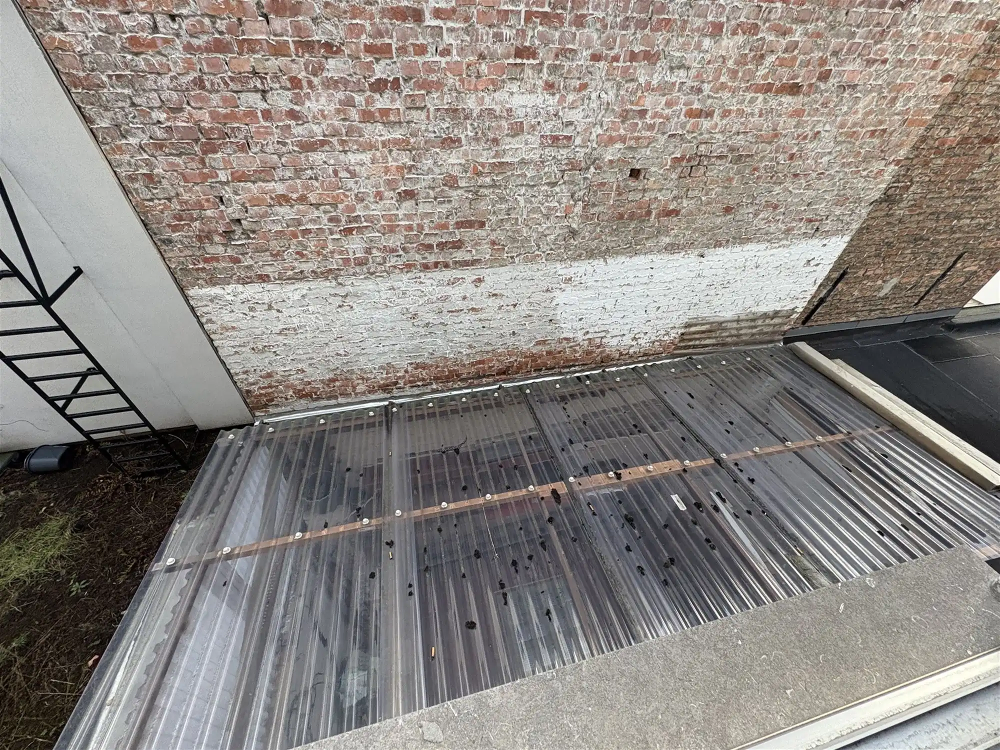 Bel-etagewoning met garage aan Sint-Andriesplaats. foto 20