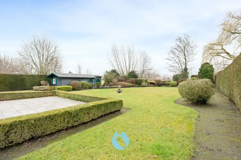Charmante woning met riante tuin op een perceel van 1.061 m² in een rustige verkaveling te Evergem. foto 19