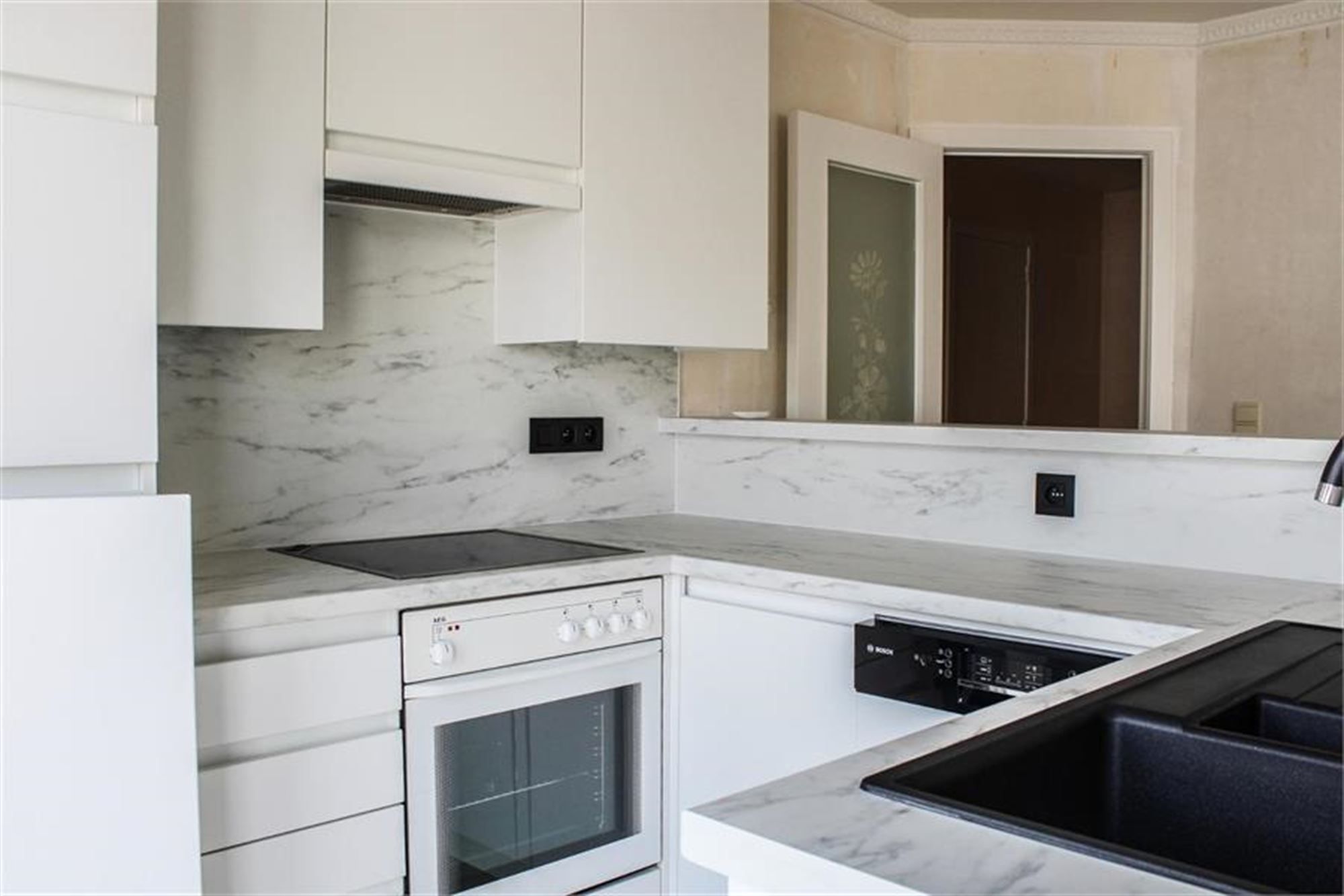 Zonnig en instapklaar hoekappartement vlakbij strand en winkels! foto 6