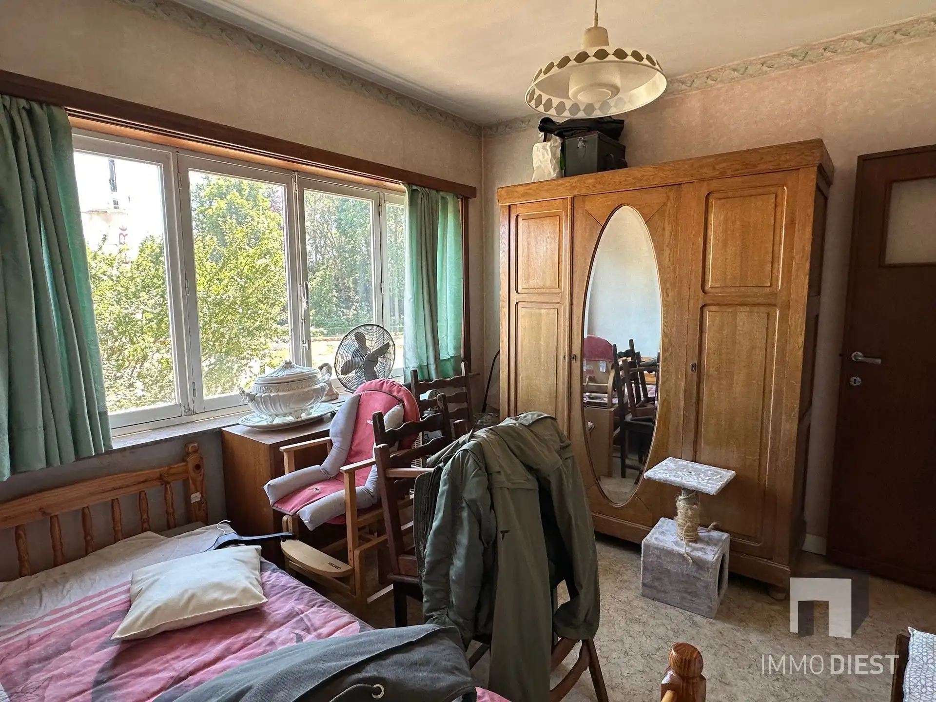 Te renoveren woning met 3 slaapkamers, 2 garages en tuin in Diest foto 20