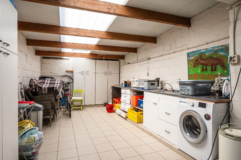Goed onderhouden woning met zonnig terras en leuke tuin foto 16