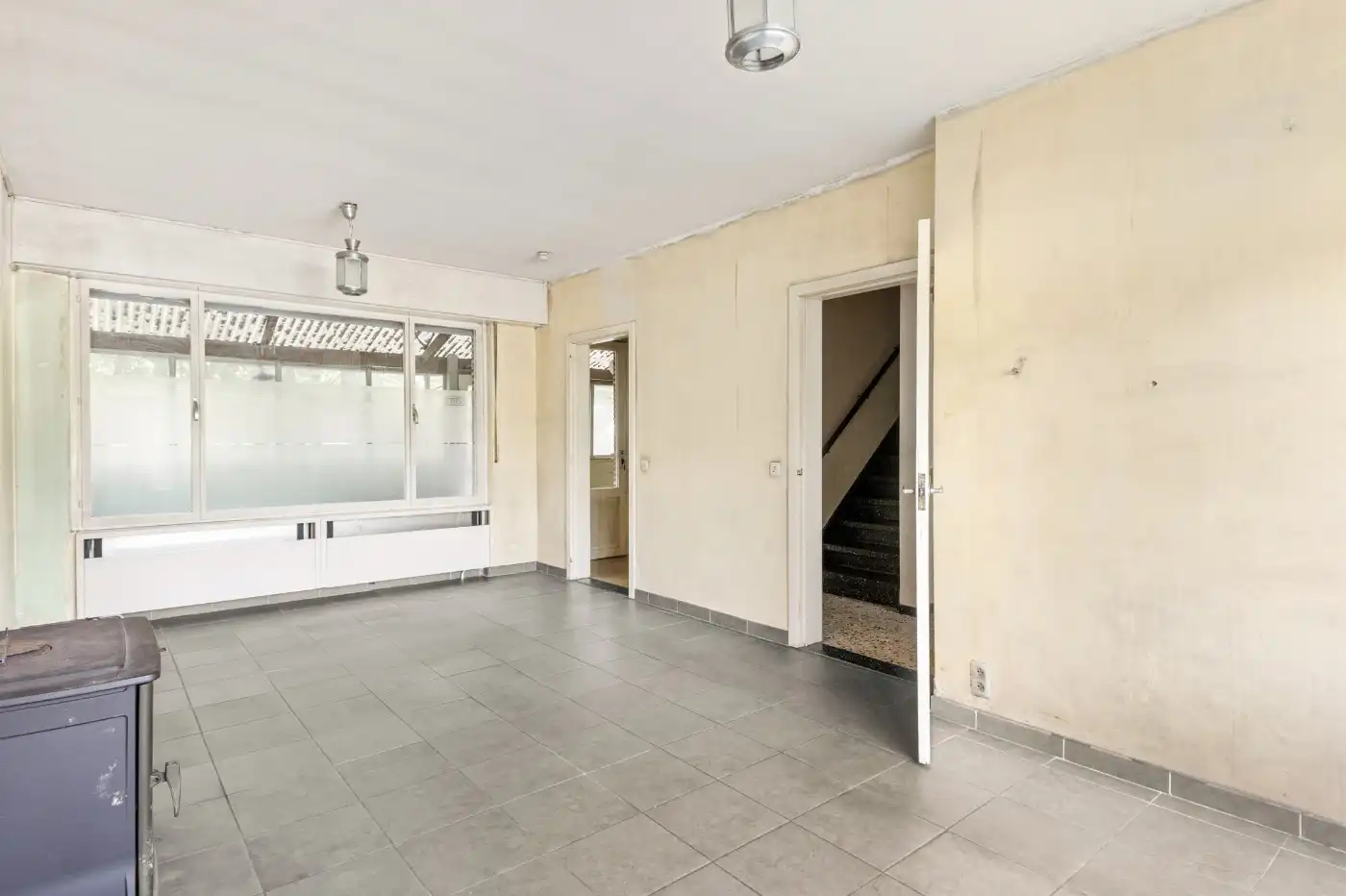 Te renoveren woning met 3 slpk., garage en tuin foto 5