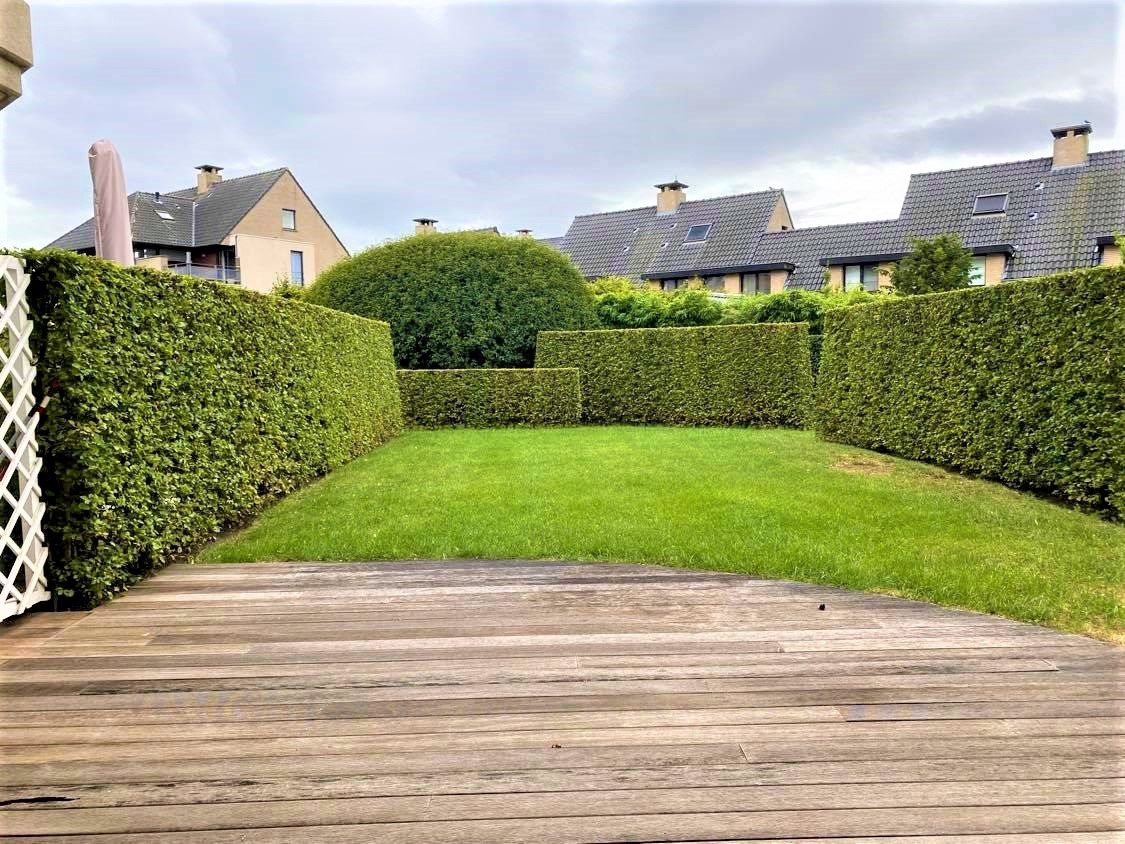 Luxueus gelijkvloers appartement met tuin foto 7