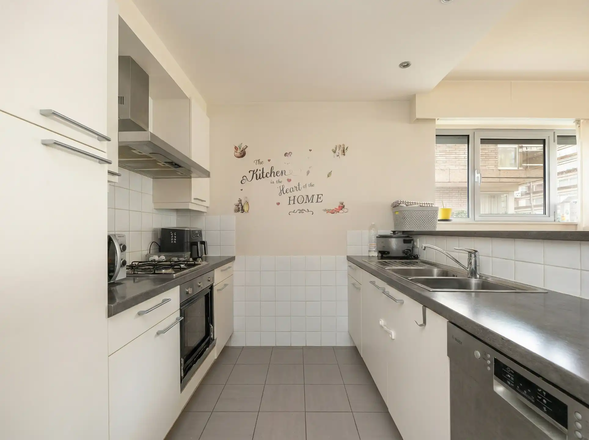 Gelijkvloers appartement met 2slkp en grote tuin foto 10