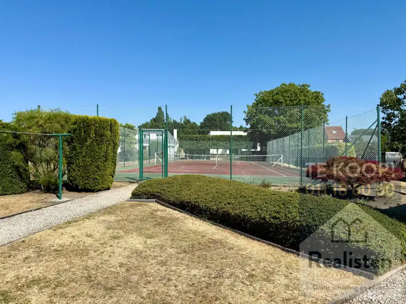 Charmant en ruim huis te koop in Stokrooie - Perfecte gezinswoning met 4 slaapkamers en een tennisplein foto 11
