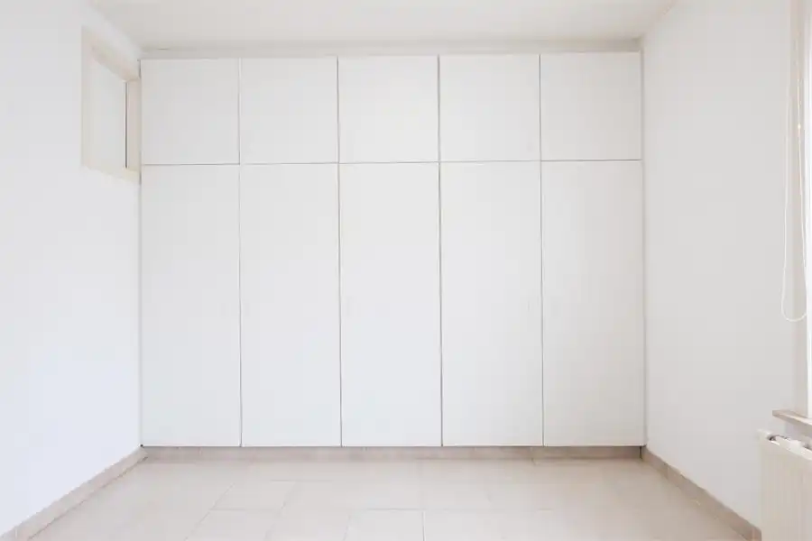 Centraal gelegen gelijkvloers 2-slaapkamerappartement — ideaal als starter of opbrengsteigendom foto 12