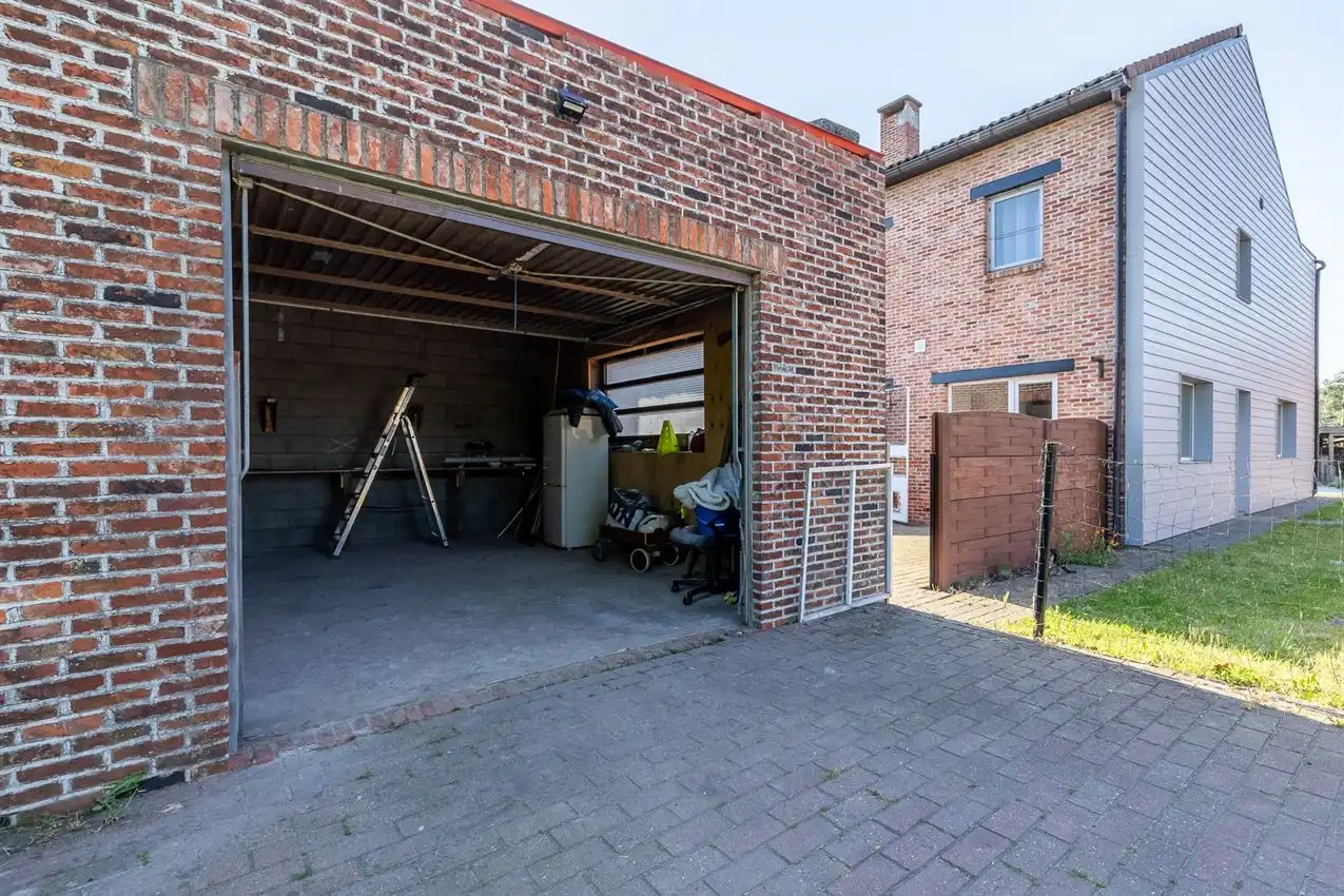 Verzorgde woning met 2 slpk., tuin en garage foto 27