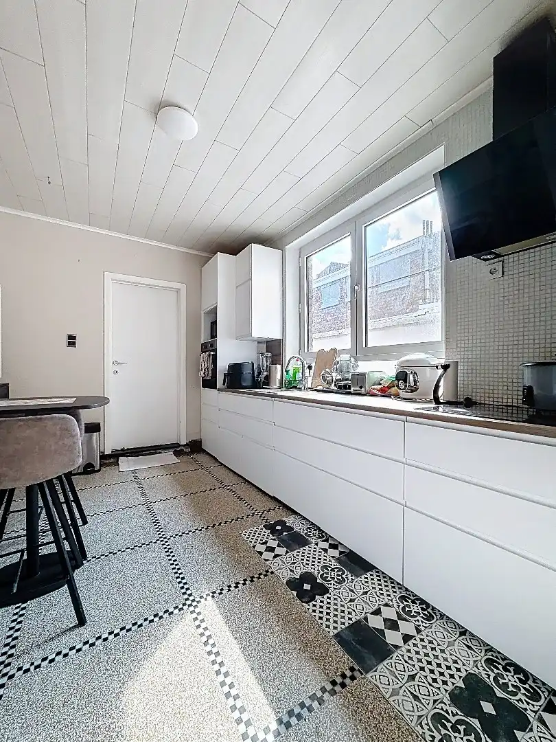 Ontdek deze instapklare parel in Tienen, waar comfort, ruimte en kwaliteit samenkomen. foto 8