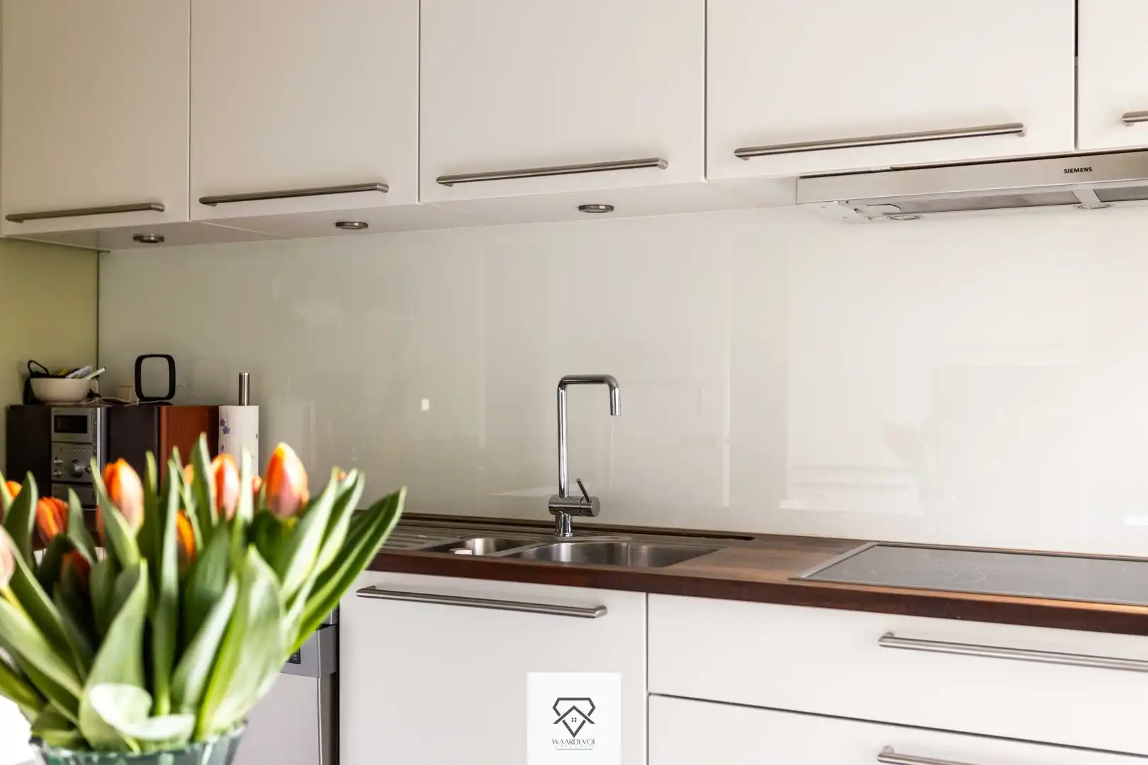 Gelijkvloerse woning met tuin en veel potentieel in Drongen foto 11