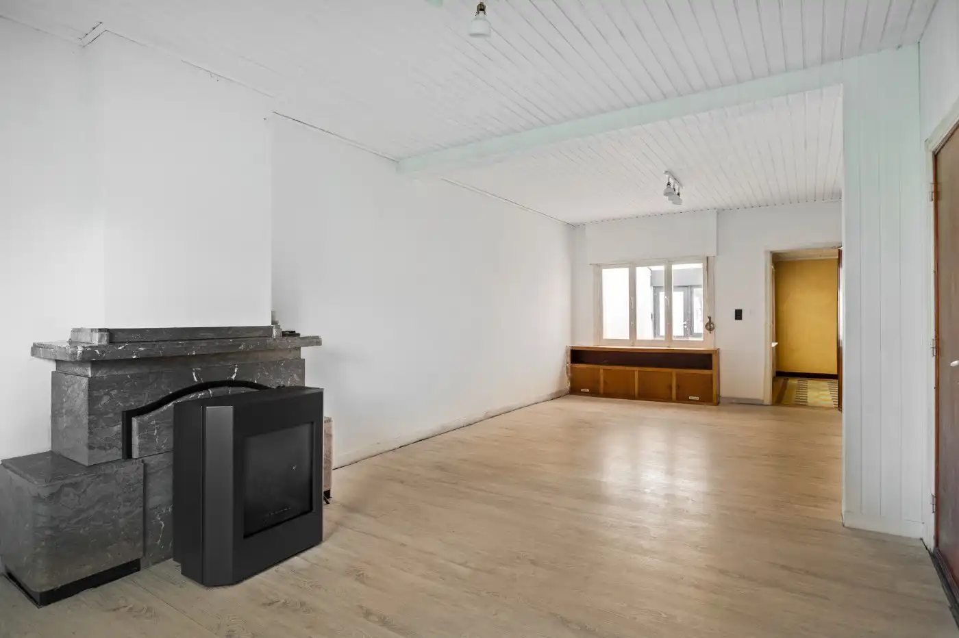 Deels gerenoveerde gezinswoning met 3 à 4 slpk. en tuin foto 4