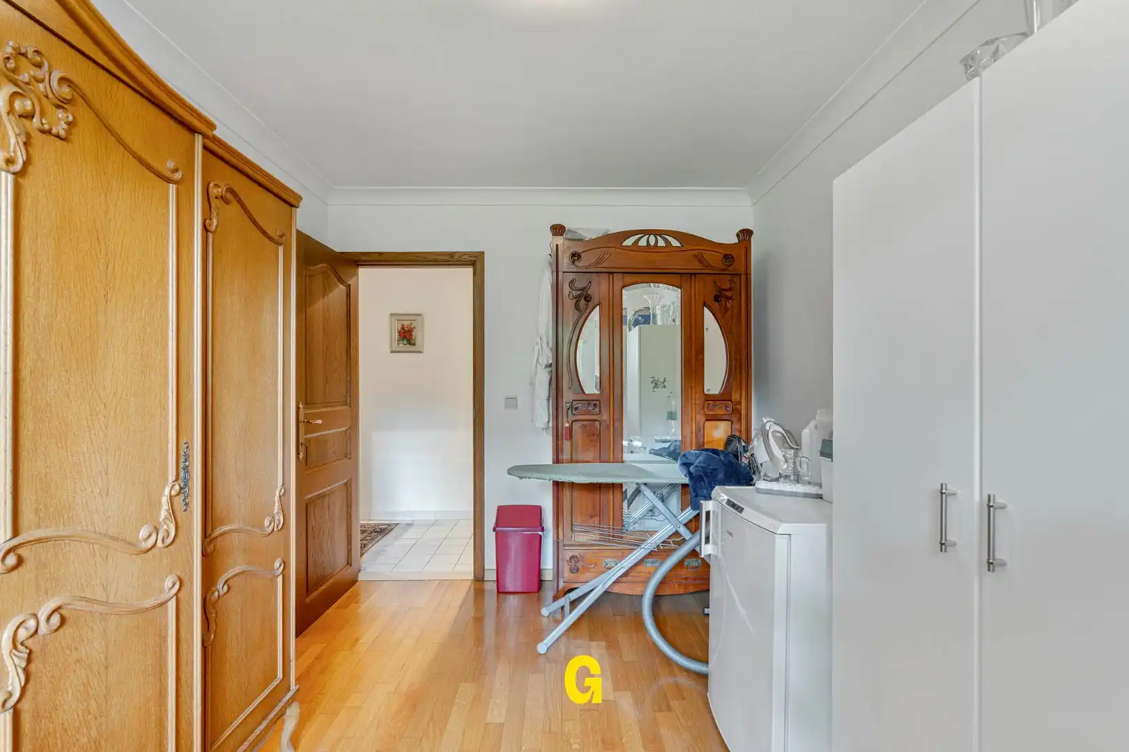 Uitstekend verzorgd 2-slaapkamer appartement in hartje Bilzen, met standplaats, kelderberging en terras met zicht op het Park van Haffmans foto 24