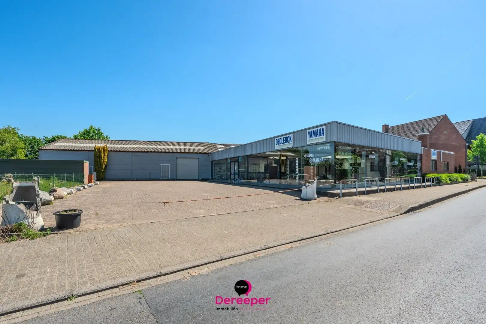 Commercieel pand met showroom, atelier, opslagplaatsen en woonst op toplocatie foto 9