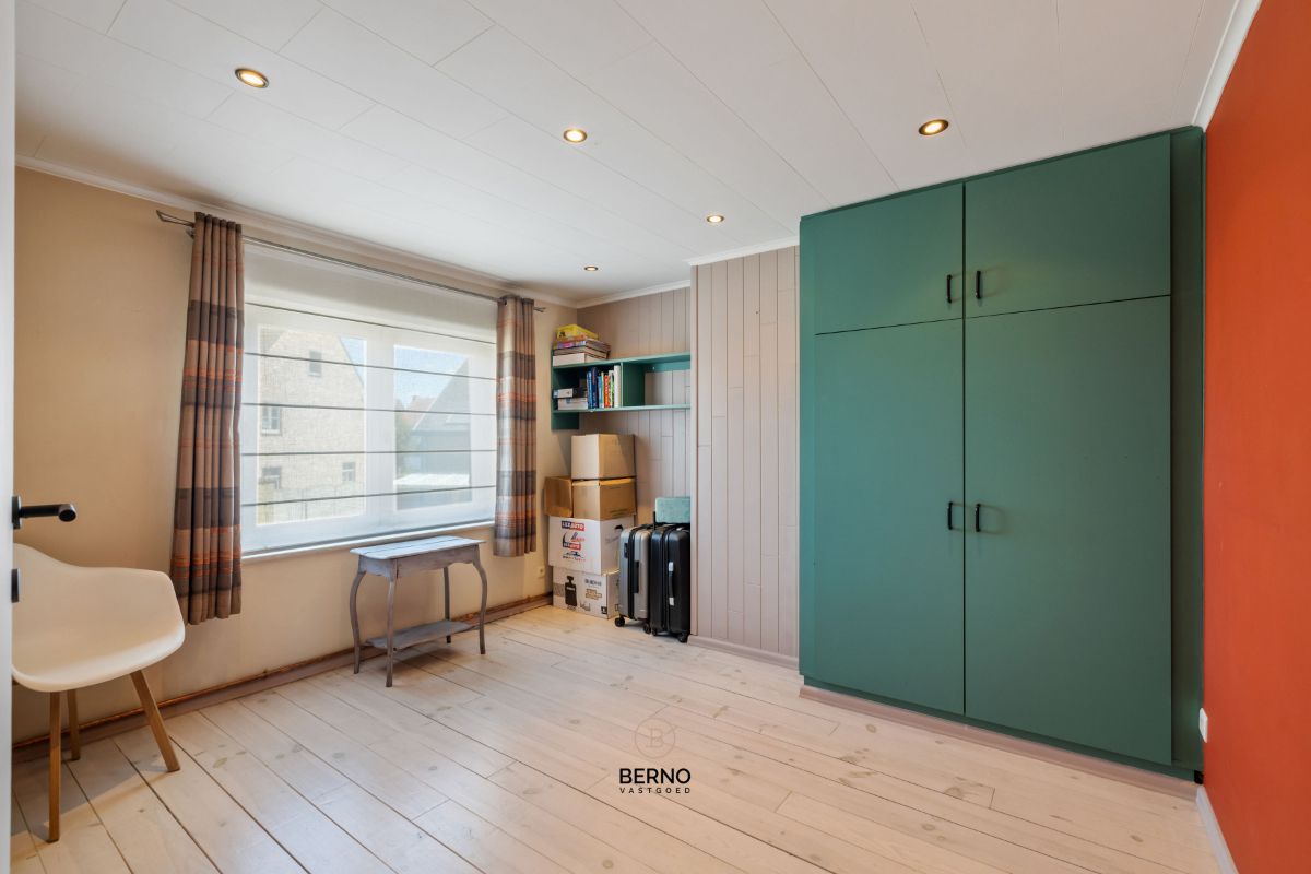Instapklare rijwoning met 3 slaapkamers, ruime garage en zongerichte tuin. foto 19