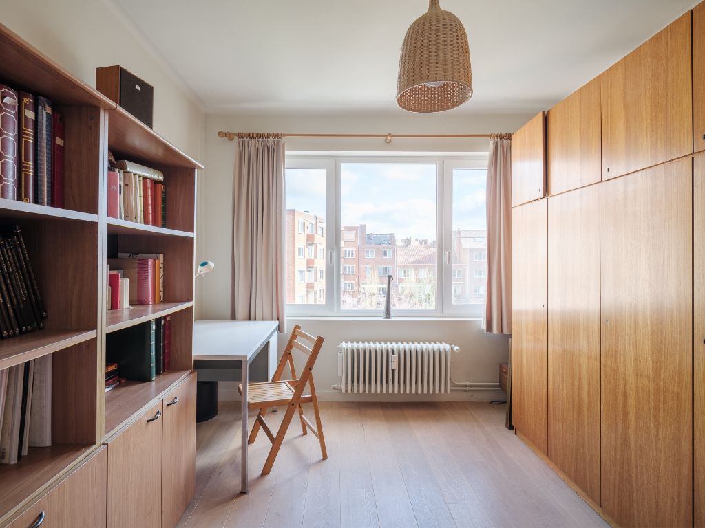 Lichtrijk appartement met 2 volwaardige slaapkamers, inpandig terras en gemeenschappelijke tuin, in een residentiële straat nabij het station Gent-Sint-Pieters. foto 12