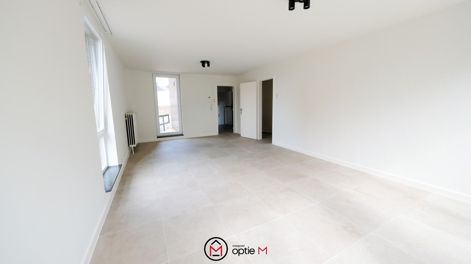 RUIM APPARTEMENT MET 3 SLAAPKAMERS, TERRAS EN GARAGEBOX foto 4
