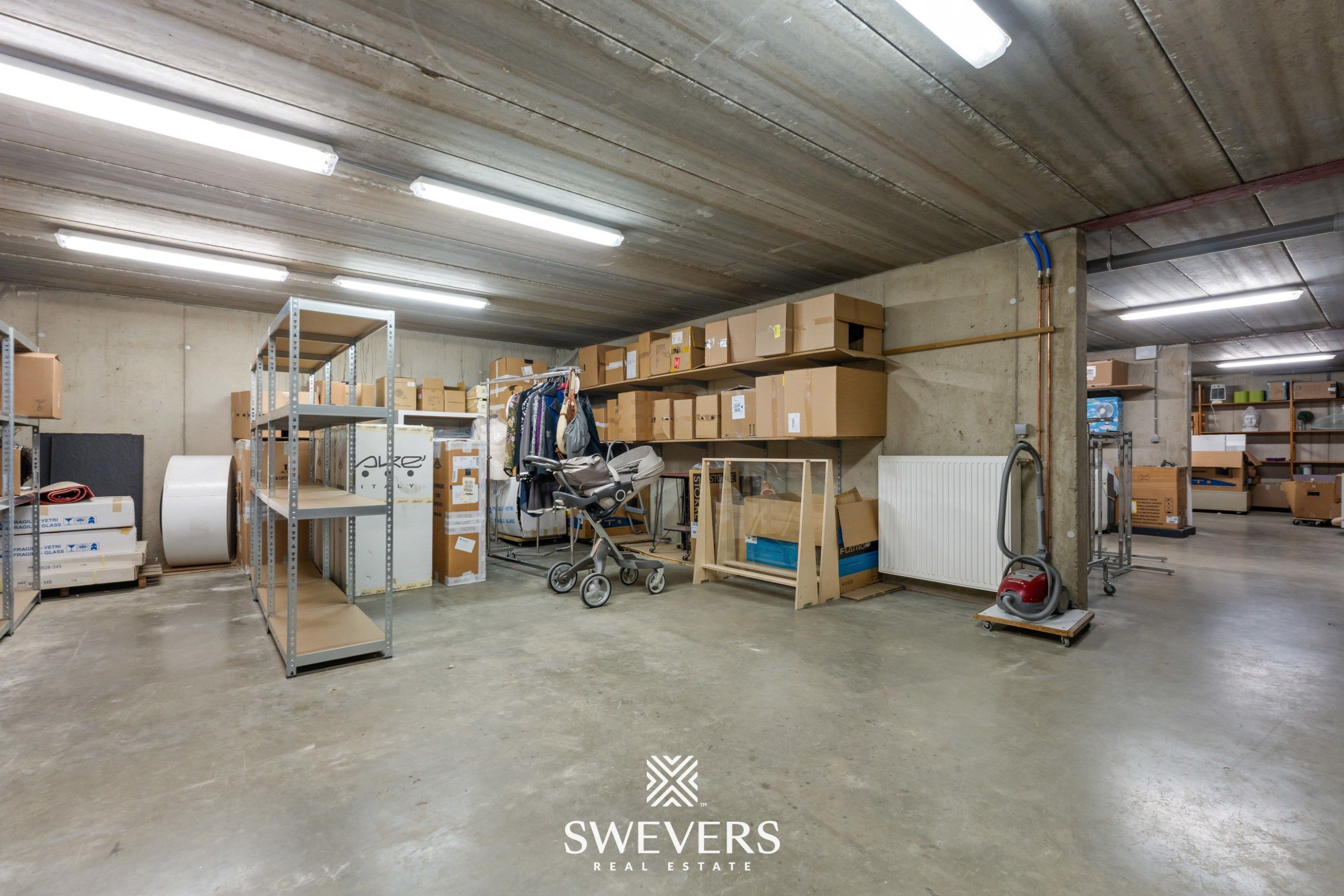 Opbrengsteigendom met handelspand, ruim appartement en uitbreidingspotentieel in hartje Heusden-Zolder foto 12