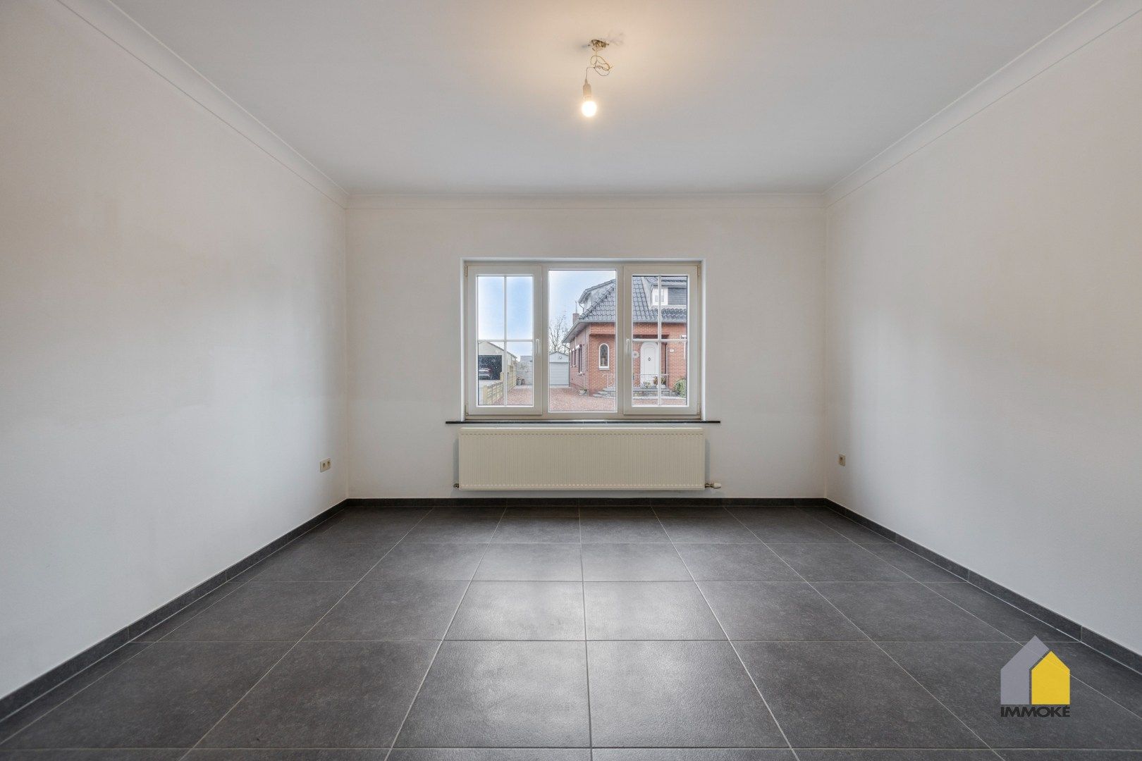 Energiezuinige woning op 3 a 14 ca met 3 slpk, 2 badkamers en knusse tuin. foto 12