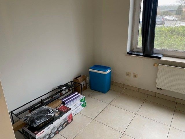 Ruim gelijkvloers appartement met terras en carport. foto 10