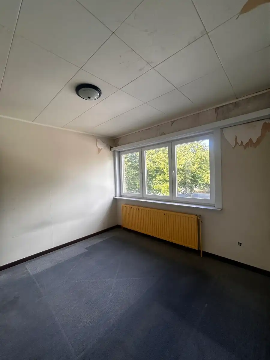 Ruime woning met 5 slpk, 2 badkamers, garage en ruime tuin foto 14