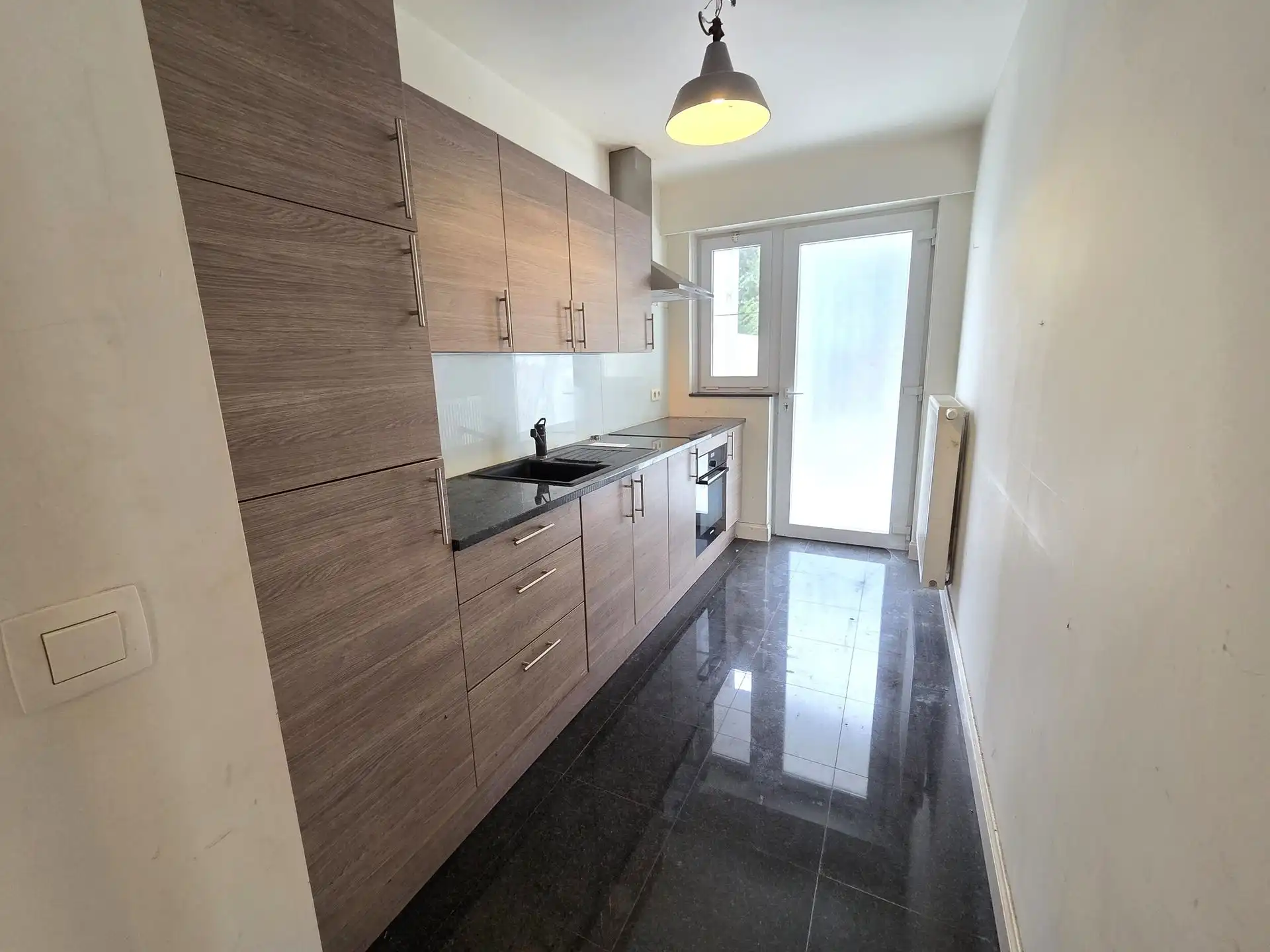 Instapklaar gelijkvloers appartement met zonnige tuin foto 4