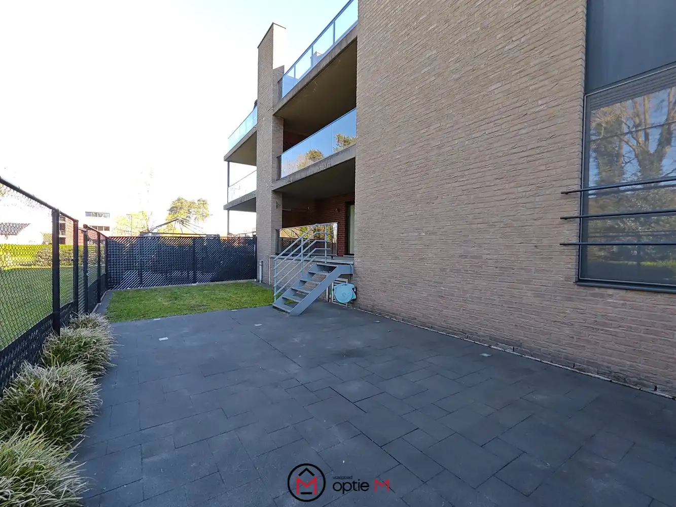 Appartement te huur in Genk – gelijkvloers wonen met tuin en overdekt terras foto 14