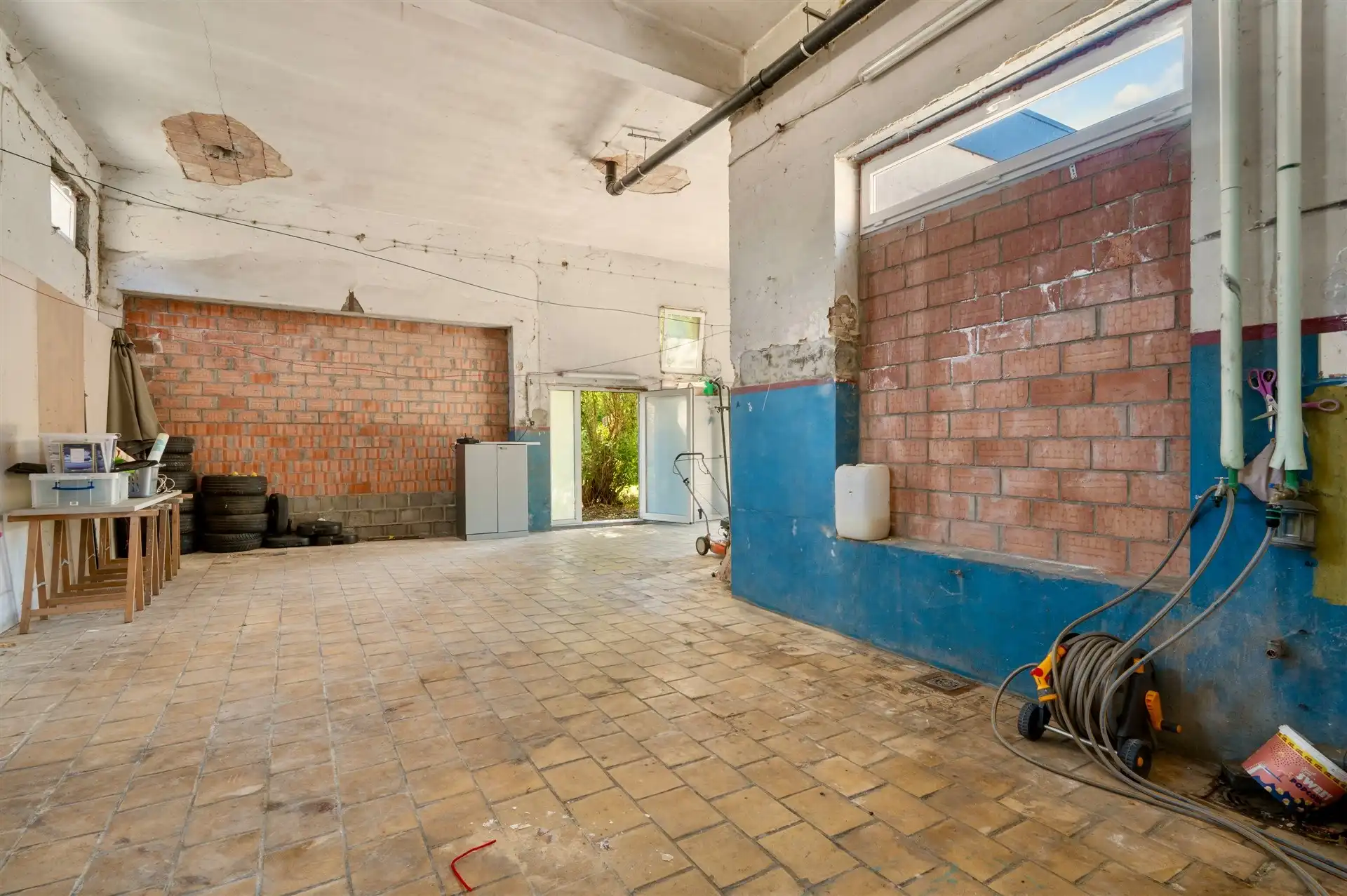 Ruime woning met multifunctioneel bijgebouw en grote tuin foto 25