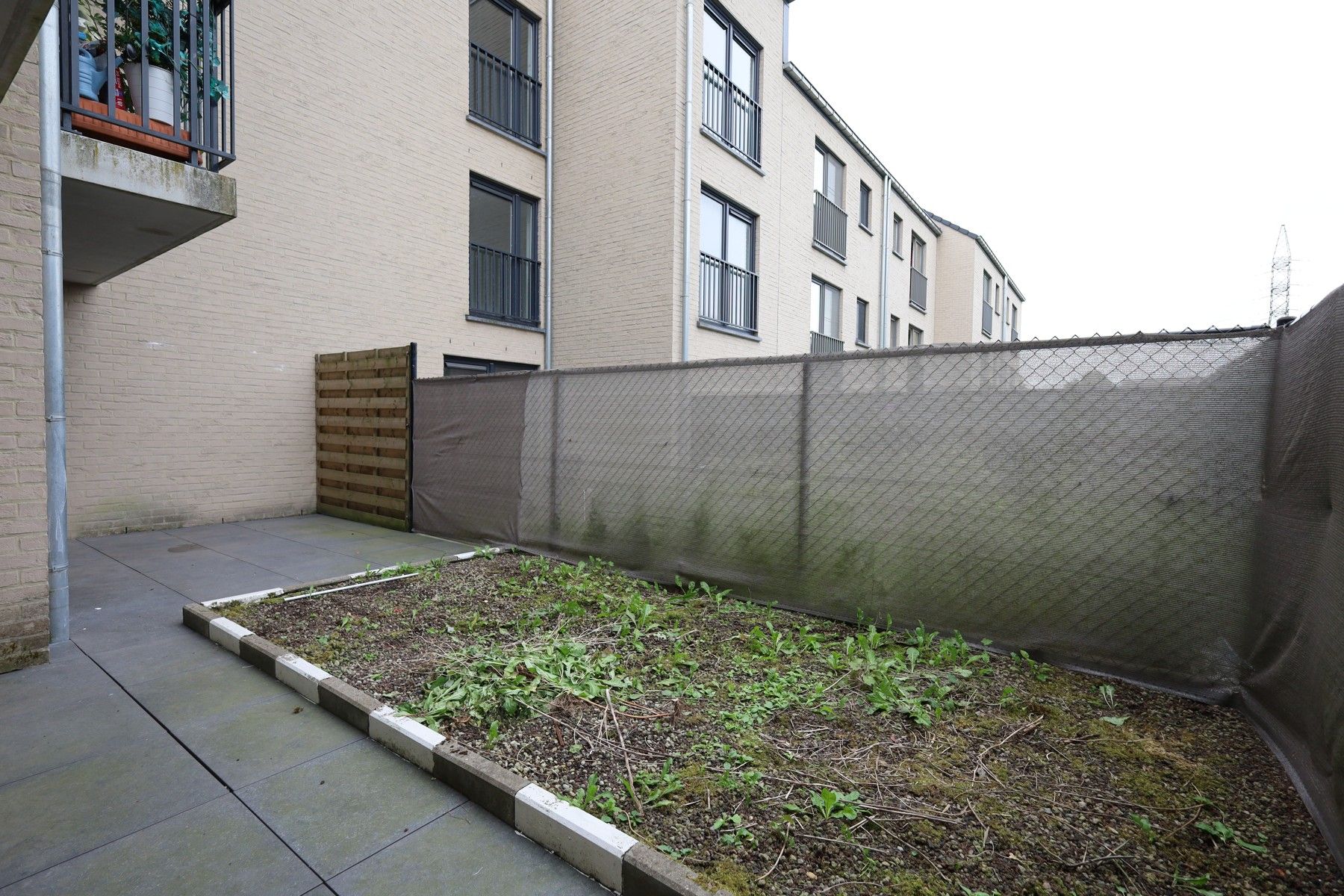 Gelijkvloers 1-slaapkamerappartement met groot terras/klein privétuintje foto 10