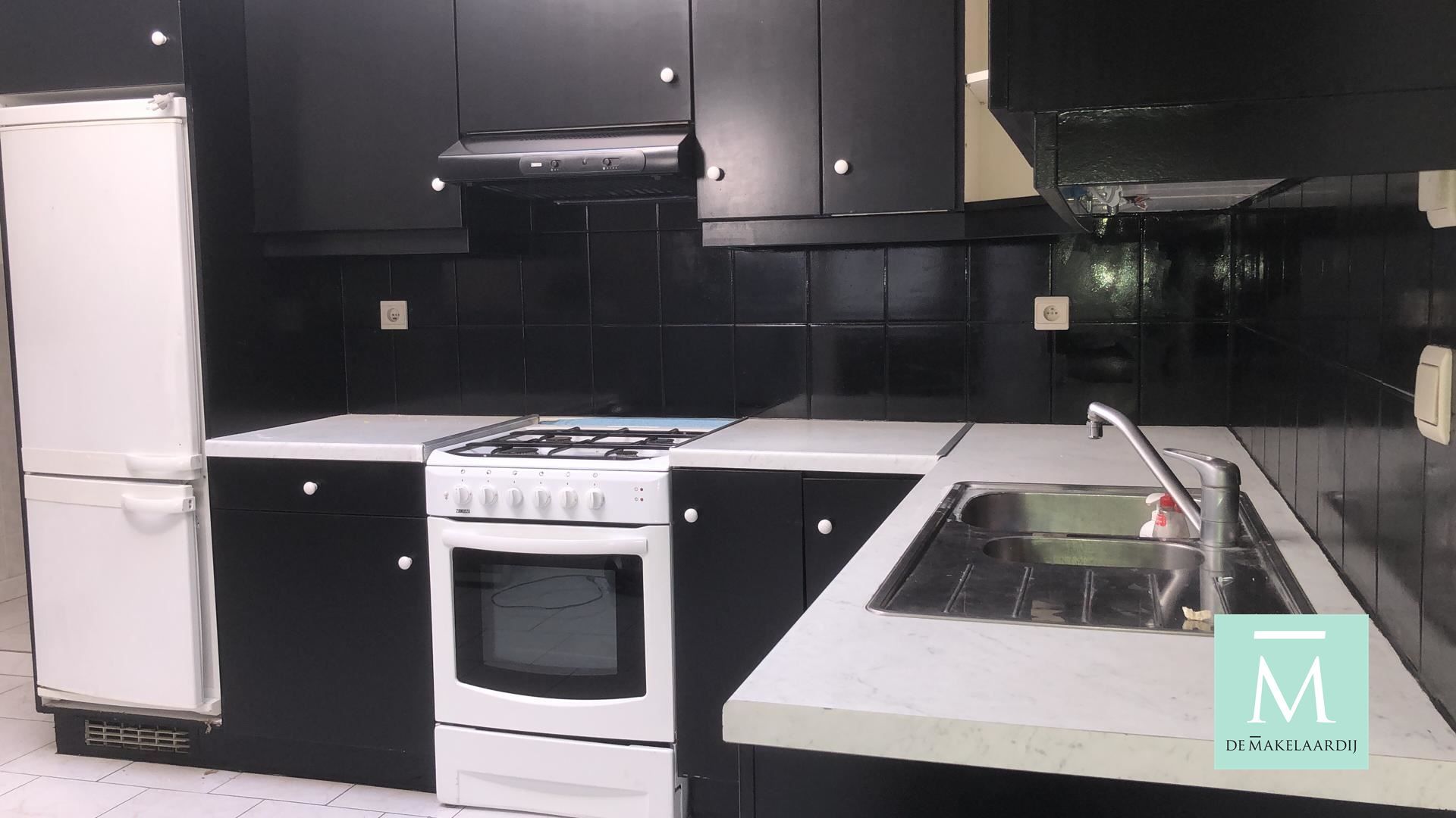 Charmante woning met 2 slaapkamers en leuk terrasje op toplocatie! foto 4