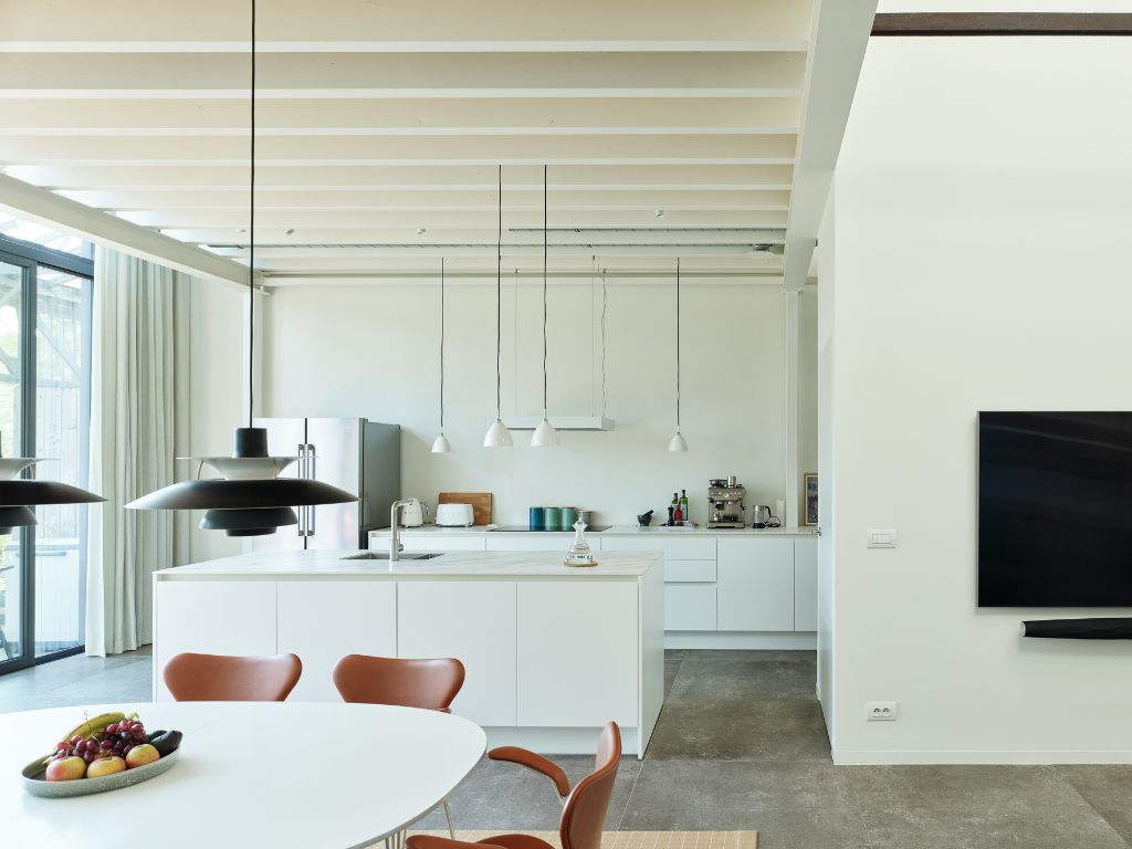 Luxueus en tijdloos – Exceptionele loft met 2 slaapkamers (mogelijkheid tot 3), ontworpen door ‘Plano Architecten’, in een beschermd gebouw met een rijkelijke industriële voorgeschiedenis. foto 7