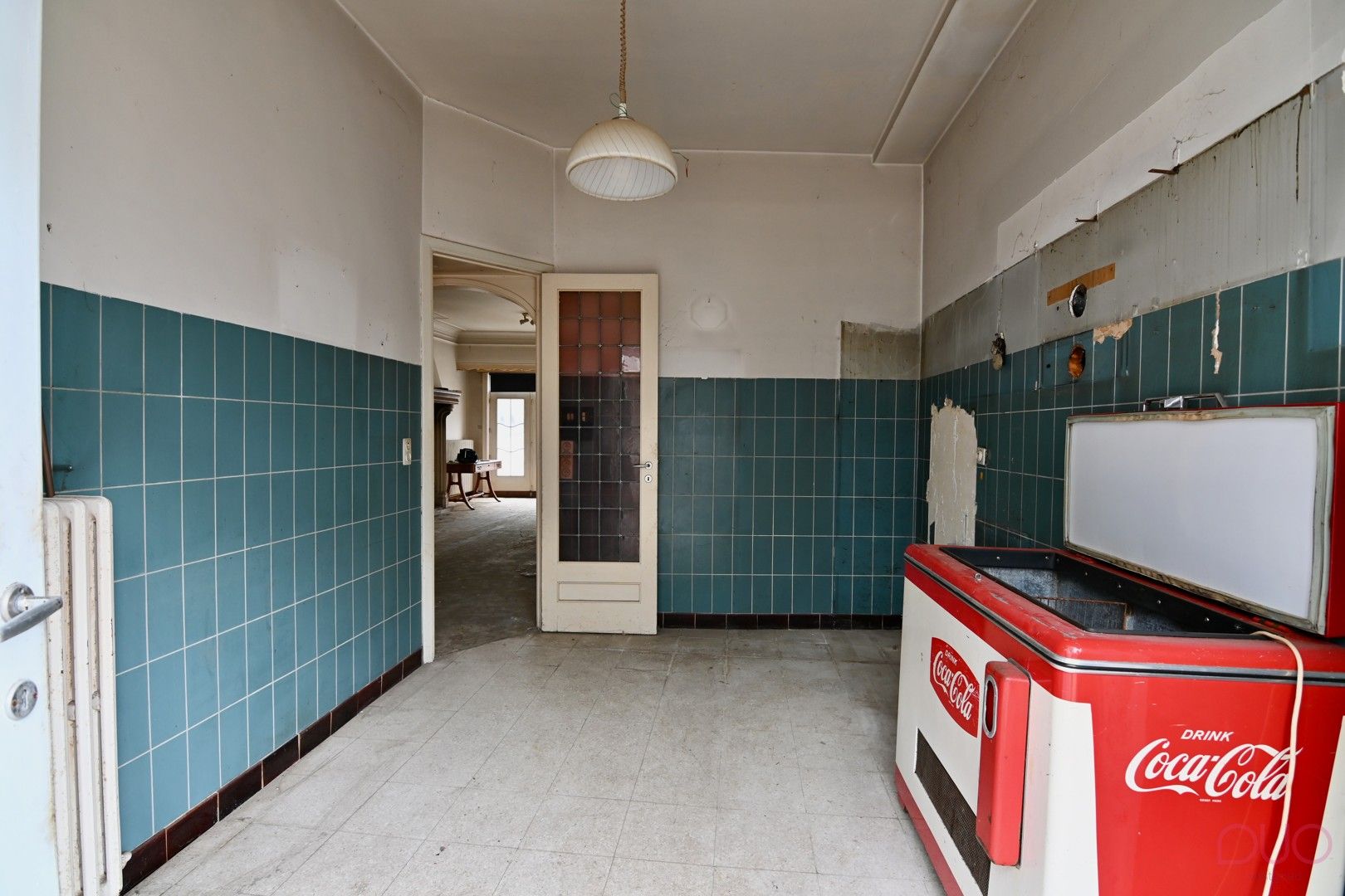 Te renoveren gelijkvloers appartement met 2 slaapkamers en patio foto 4