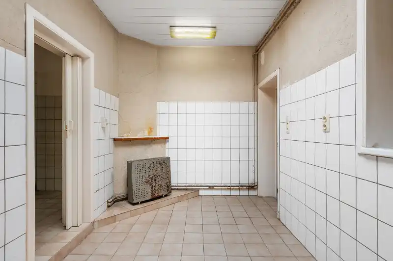 Te renoveren starterswoning met 2/3 slaapkamers en tuinjte foto 8