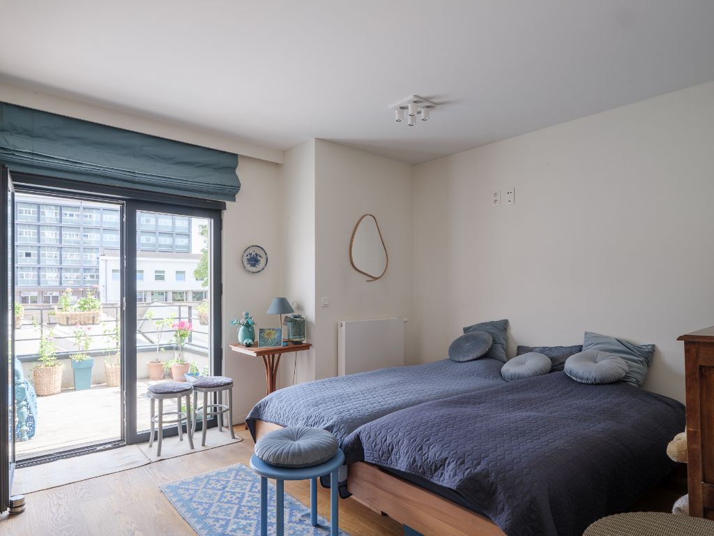 Omgeving Sint-Pietersstation. Ruim 2 slaapkamer appartement met aangenaam terras en zicht op groen, zowel aan de voor- als achterzijde foto 15