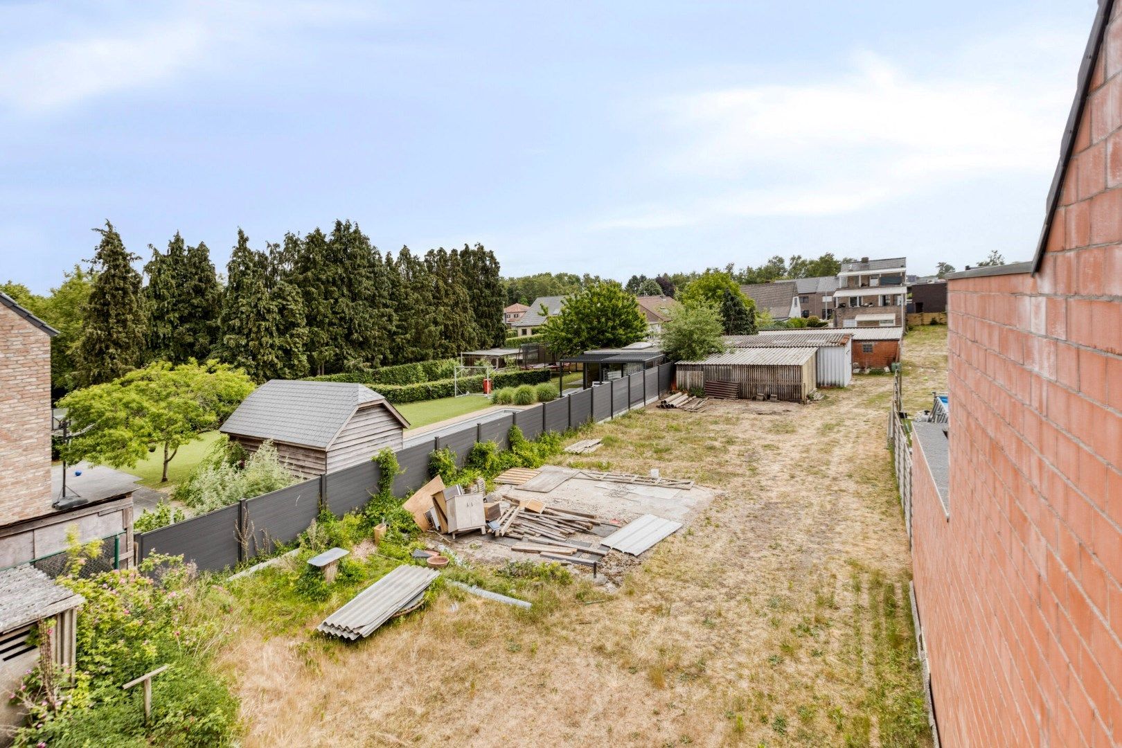 Bouwgrond van 674m² met af te  breken woning in een doodlopende straat te Ginderbuiten ! foto 10