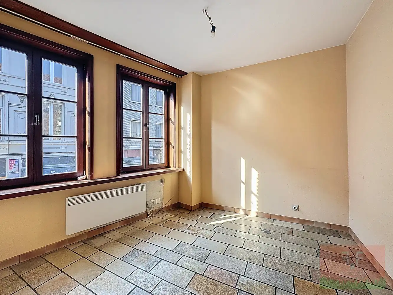 Triplex appartement met gelijkvloerse verhuurbare winkelruimte en aparte garage foto 12