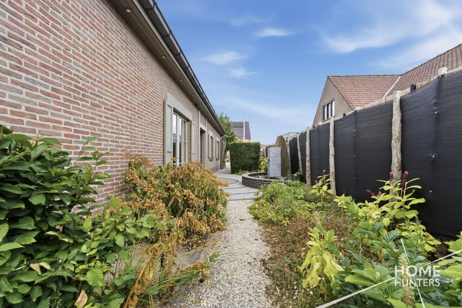 Alleenstaande woning met prachtige tuin en tal van extra troeven in een rustige wijk te Wervik foto 13