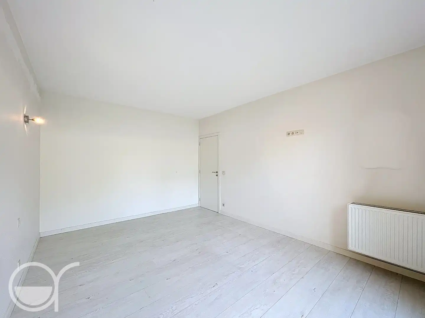 Ruim gelijkvloers appartement met twee slaapkamers, grote tuin én garagebox foto 10