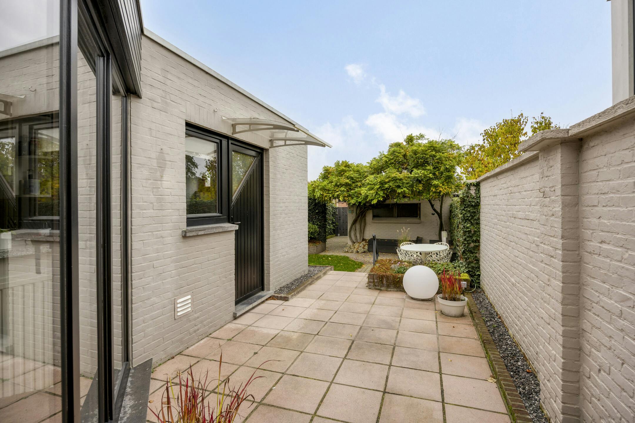 Goed gelegen stadswoning met 4 slaapkamers, tuin en garagebox + 12 zonnepanelen foto 21