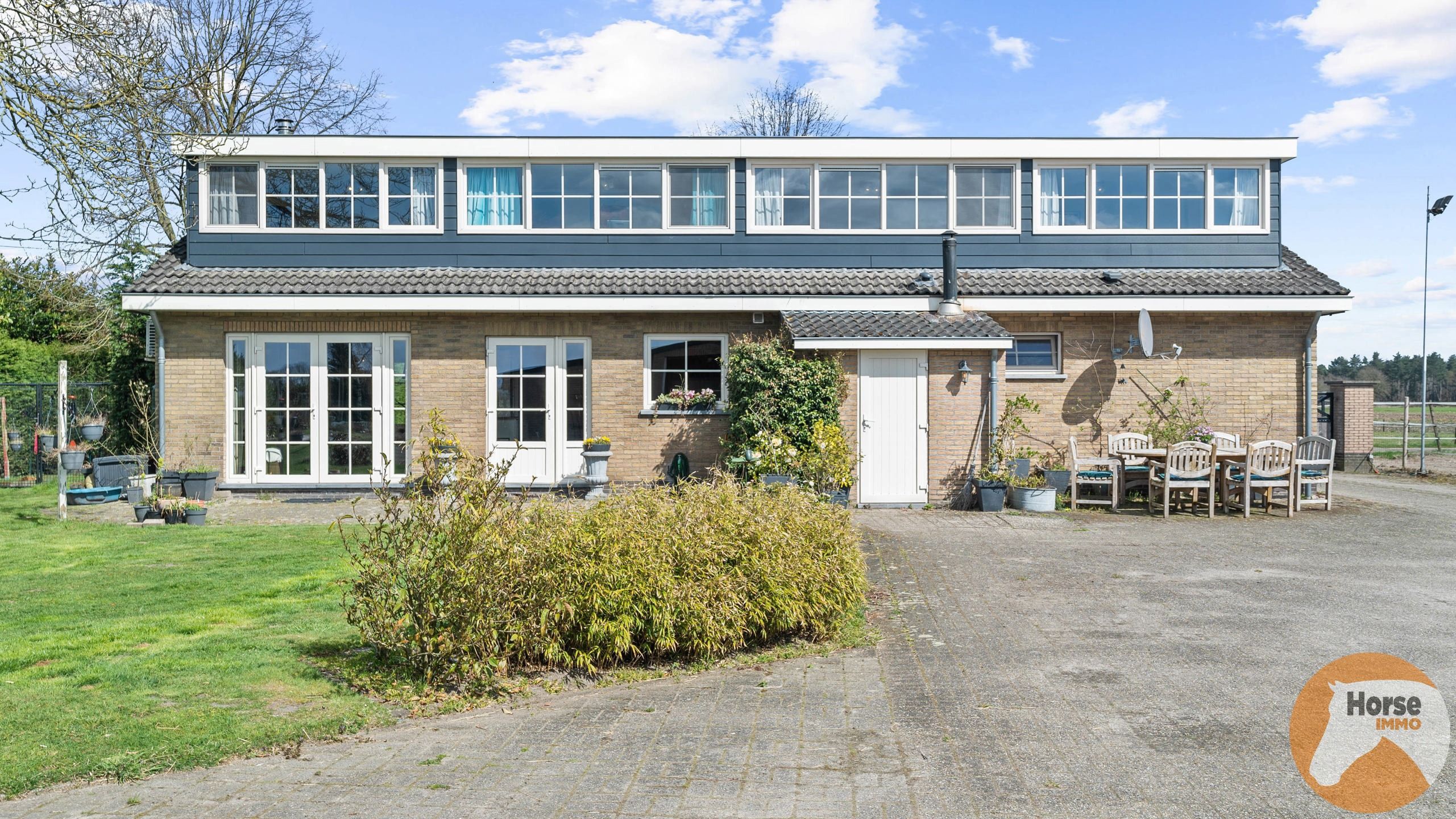 RAVELS - Instapklare woning met loods en stallen op ca.1,6Ha foto 3