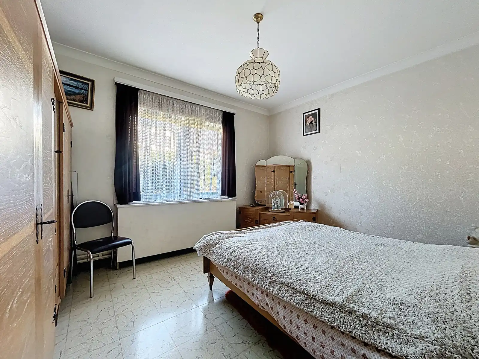 Gelijkvloerse villa met 3 slks & tuin op 7 minuten van  E40  foto 3