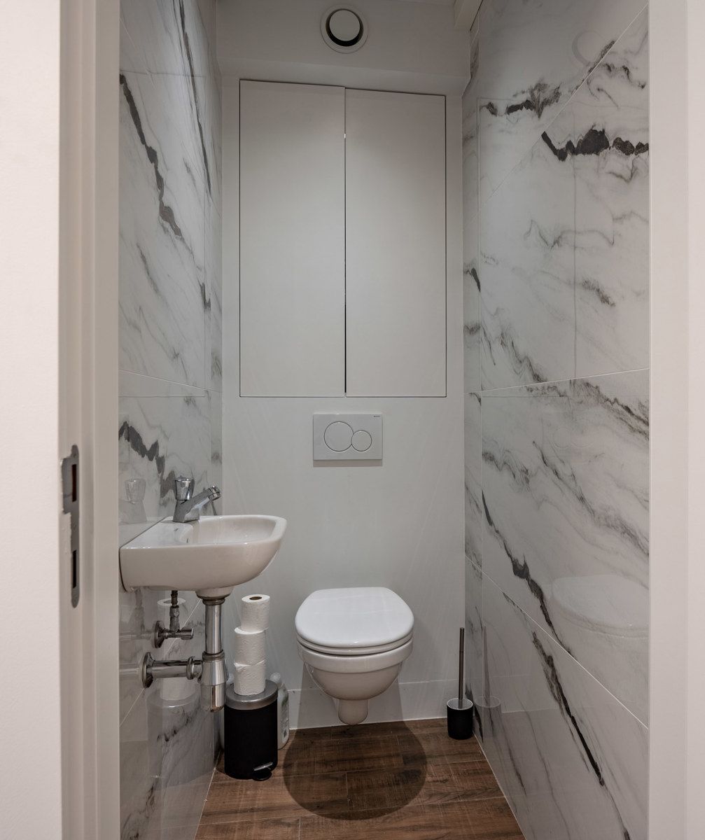 Handelsgelijkvloers (80m²) in het centrum van Stabroek met inpandige garage!  foto 8