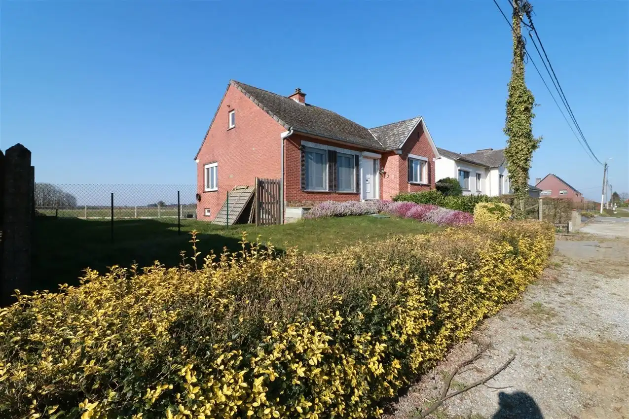 Gusting gelegen woning met 2 slpk, garage en tuin foto 34