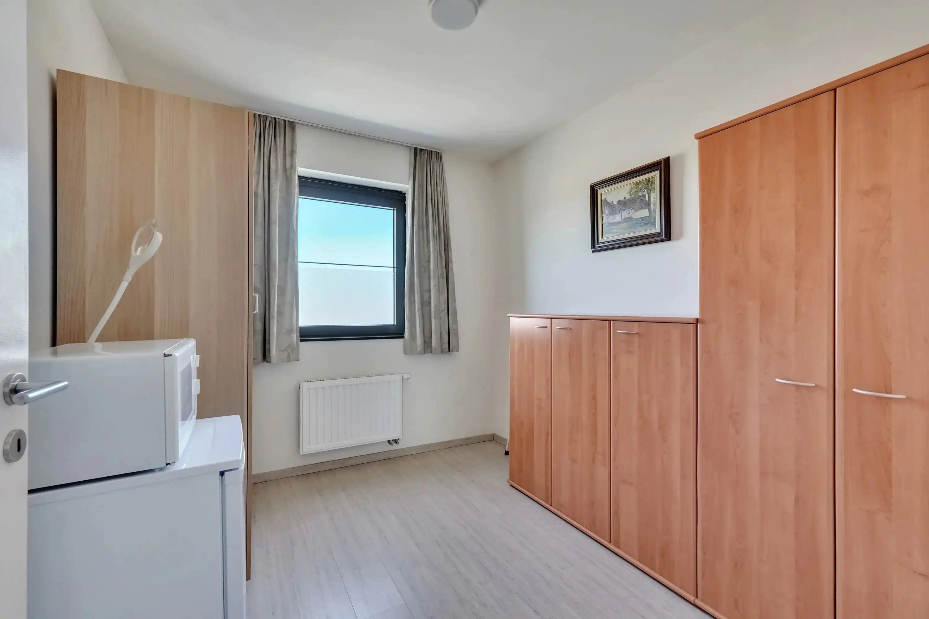 Instapklaar appartement met terras aan centrum Bilzen foto 16